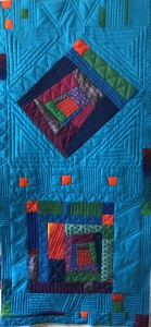 Log cabin quilted but not bound